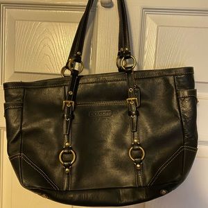 Black woman’s coach purse